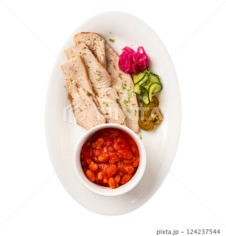 Portion of chicken brisket with beans and pickles Portion of chicken brisket with beans and pickles 124237544