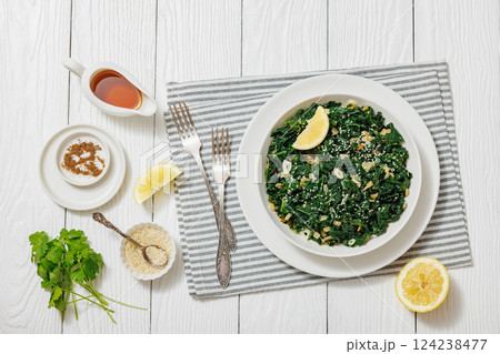 sauteed kale with garlic, onion, red pepper flakes sauteed kale with garlic, onion, red pepper flakes 124238477