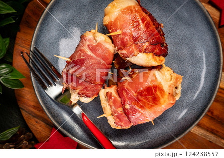 Chicken breast wrapped with bacon. Chicken breast wrapped with bacon. 124238557