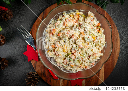 Traditional salad with cooked vegetables with mayonnaise. 124238558