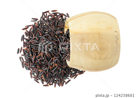 Black wild rice in wooden bowl isolated on white background close up. Top view. Flat lay 124238681