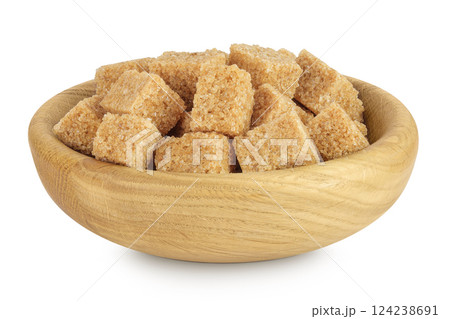 brown sugar in a wooden bowl isolated on white background brown sugar in a wooden bowl isolated on white background 124238691