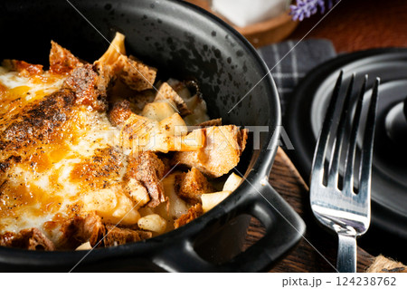 Ramekin with delicious casserole. Ramekin with delicious casserole. 124238762
