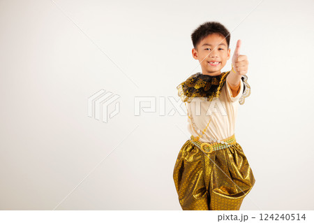 Portrait Thailand kid boy smiling traditional Thai dress costume makes thumbs up OK sign, symbolizing agreement, studio isolated white background, primary child radiates positivity and satisfaction Portrait Thailand kid boy smiling traditional Thai dress costume makes thumbs up OK sign, symbolizing agreement, studio isolated white background, primary child radiates positivity and satisfaction 124240514