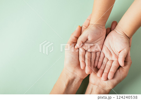 Parents and kid hold empty hands top view isolated. Illustrating Family Day togetherness support and the legacy passed down. Parents and kid hold empty hands top view isolated. Illustrating Family Day togetherness support and the legacy passed down. 124240538