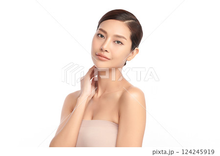 A beautiful young Asian woman with clean, fresh skin against a white background. Skincare, facial treatment, cosmetology, beauty, and spa. An elegant portrait of an Asian woman. A beautiful young Asian woman with clean, fresh skin against a white background. Skincare, facial treatment, cosmetology, beauty, and spa. An elegant portrait of an Asian woman. 124245919