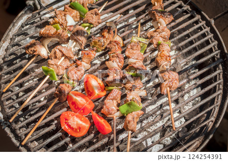Top view of delicious grilled meat skewers. grilled homemade roast beef skewers Top view of delicious grilled meat skewers. grilled homemade roast beef skewers 124254391