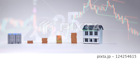 2025 real estate market forecast with house models and brick stacked 124254615