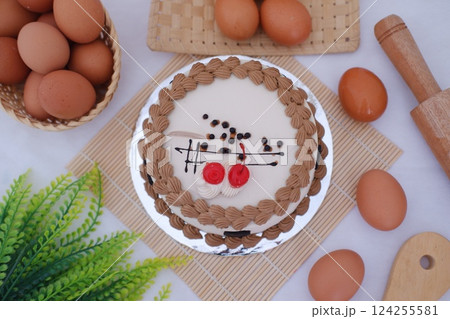 decorated round cake with white and light brown frosting decorated round cake with white and light brown frosting 124255581
