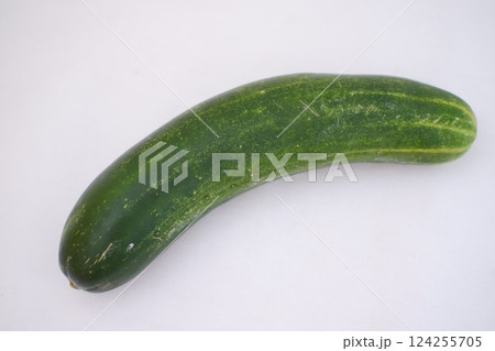Cucumber and slices on a white background. Selective focus. 124255705