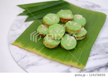 Pandan flavored cake with beautiful green leaves Pandan flavored cake with beautiful green leaves 124256650