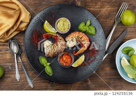 Preparing lobster tails. Preparing lobster tails. 124258136