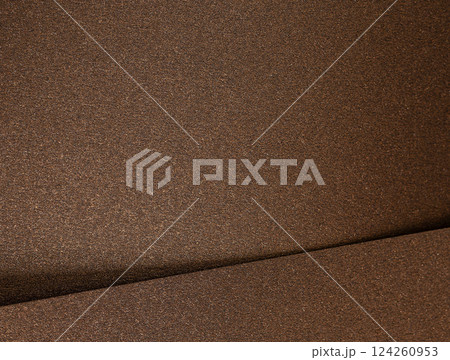 Warm gold and bronze paper background with a pearlescent, metallic texture and subtle shimmer. Light Warm gold and bronze paper background with a pearlescent, metallic texture and subtle shimmer. Light 124260953