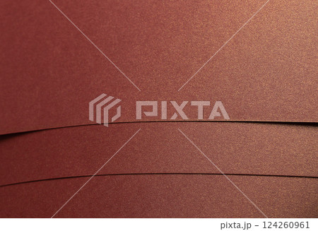 Rich burgundy paper texture with a pearlescent shimmer and glossy finish. Elegant and metallic Rich burgundy paper texture with a pearlescent shimmer and glossy finish. Elegant and metallic 124260961