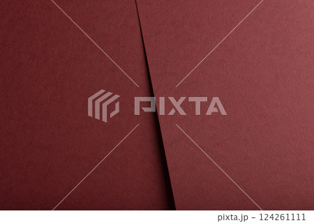 Deep burgundy paper background with a matte, grainy texture and subtle fibrous surface. Rich red 124261111