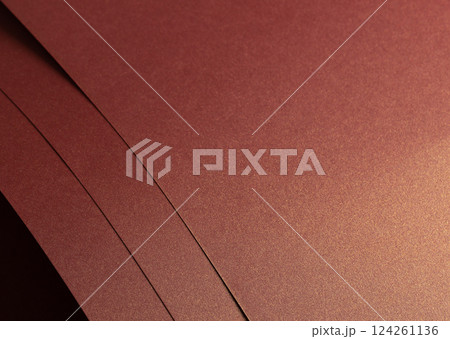 Burgundy paper background with a glossy, pearlescent texture and shimmering metallic finish. Warm, Burgundy paper background with a glossy, pearlescent texture and shimmering metallic finish. Warm, 124261136