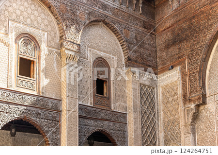 Pgeon sitting on a decoration in Al-Attarine Madrasa in Fes, Morocco. 124264751