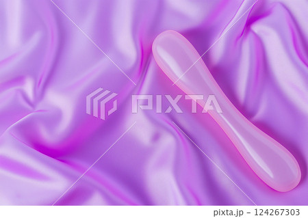 Vibrator on pink background, top view Vibrator on pink background, top view 124267303