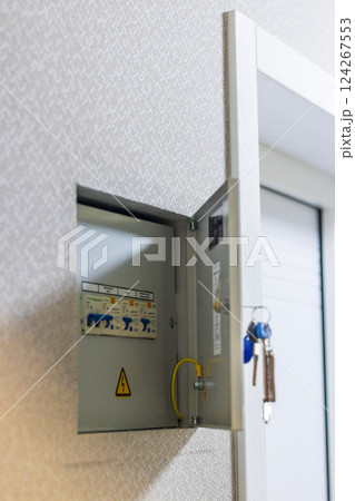 Open electrical switchboard in the apartment Open electrical switchboard in the apartment 124267553