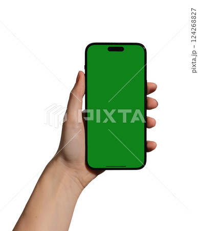 Phone held in hand, displaying screen with green chromakey. Woman presenting smartphone, showcasing 124268827