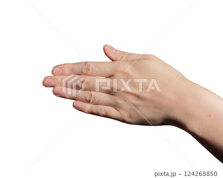 Hand with natural, neat manicure, demonstrating elegant, shiny nails. Clean, polished, and 124268850