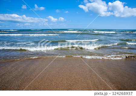 The coast of the Caspian Sea. The beach of the city of Derbent. Republic of Dagestan, Russia 124268937