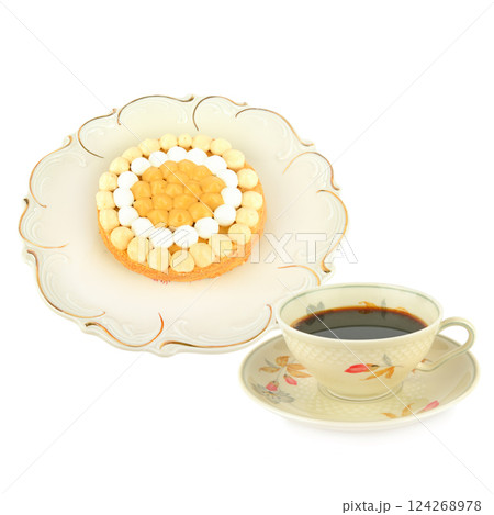 Birthday cake on a vintage porcelain dish and Coffee in vintage porcelain cup isolated on a white background. Birthday cake on a vintage porcelain dish and Coffee in vintage porcelain cup isolated on a white background. 124268978