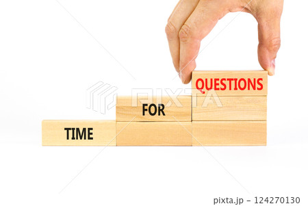 Time for questions symbol. Concept words Time for questions on beautiful wooden blocks. Beautiful white table white background. Businessman hand. Business time for questions concept. Copy space. 124270130