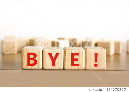 Bye symbol. Concept word Bye on beautiful wooden blocks. Beautiful wooden table white background. Business and bye concept. Copy space. Bye symbol. Concept word Bye on beautiful wooden blocks. Beautiful wooden table white background. Business and bye concept. Copy space. 124270207