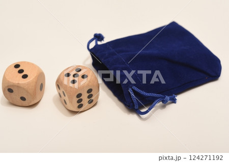 Dice on a white background. Large and small dice. Dice on a white background. Large and small dice. 124271192
