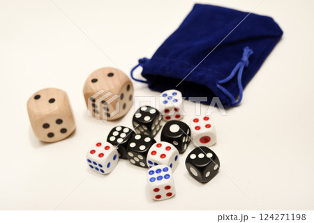 Dice on a white background. Large and small dice. 124271198
