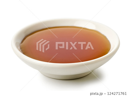 bowl of maple syrup 124271761