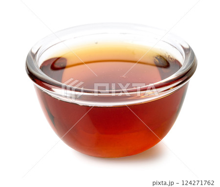 bowl of maple syrup 124271762