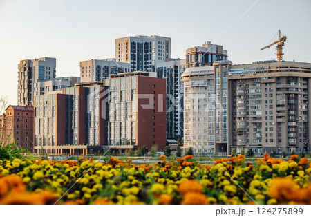Buildings of Yekatirenburg on the background of flowerbeds. 124275899