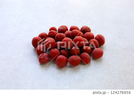 Umeboshi, Japanese pickled plums, Sour and salty taste. Umeboshi, Japanese pickled plums, Sour and salty taste. 124276858