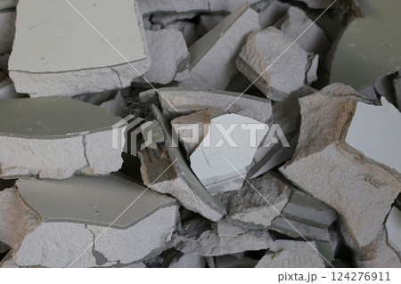 Broken concrete, Piles of lightweight construction bricks after house demolition Broken concrete, Piles of lightweight construction bricks after house demolition 124276911
