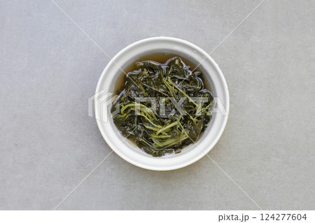 Pickled spider weed, salted fermented vegetable Pickled spider weed, salted fermented vegetable 124277604