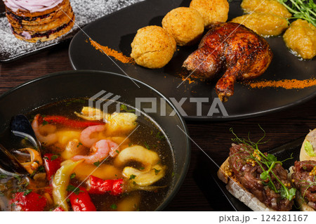 Beautifully decorated first course and dessert on Beautifully decorated first course and dessert on 124281167