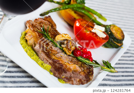 Veal with baked vegetables is tasty dish 124281764