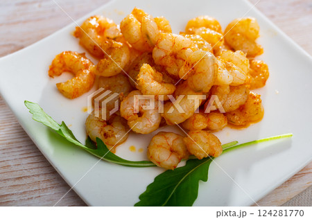 Appetizing baked shrimps with herbs Appetizing baked shrimps with herbs 124281770