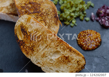 Beef tartare. Cold appetizer of raw marinated meat Beef tartare. Cold appetizer of raw marinated meat 124282007