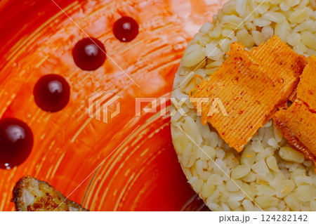 Grilled fresh red fish lies on a plate along with Grilled fresh red fish lies on a plate along with 124282142