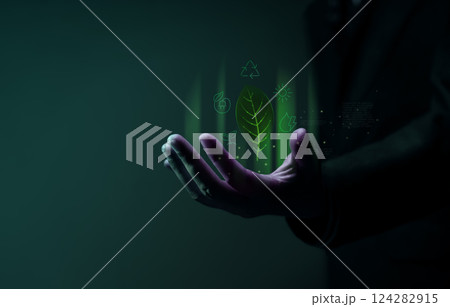 Green Energy, Renewable and Sustainable Resources in Environmental Concept. Holding a Leaf and many Furistic graphic Renewable Icons Green Energy, Renewable and Sustainable Resources in Environmental Concept. Holding a Leaf and many Furistic graphic Renewable Icons 124282915