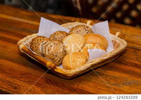 Bread basket with white and black bread on a 124283209