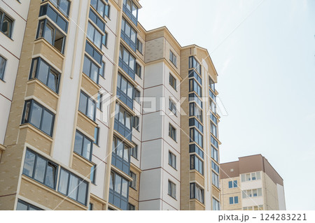 Facade of a modern residential building. New 124283221