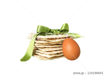 Passover, Matzah with green ribbon and egg, isolated on white, PNG 124286691