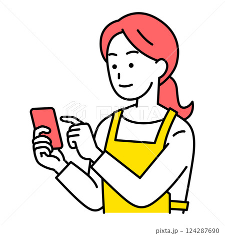 スマートフォンを操作するエプロン姿の女性 124287690