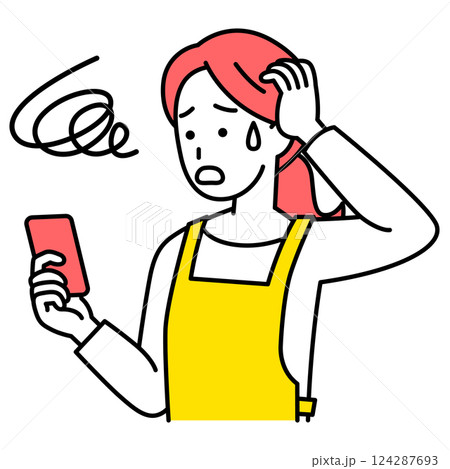スマートフォンの画面を見て困惑するエプロン姿の女性 124287693