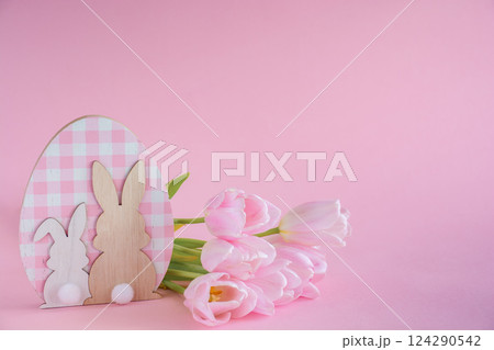 Easter Decoration with Pink Tulips on Pink Background with Copy Space Easter Decoration with Pink Tulips on Pink Background with Copy Space 124290542
