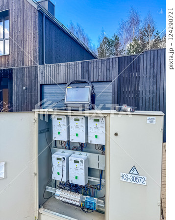 Electrical equipment.energy meter is a device that measures the amount of electric energy consumed by a residence. High quality photo Electrical equipment.energy meter is a device that measures the amount of electric energy consumed by a residence. High quality photo 124290721